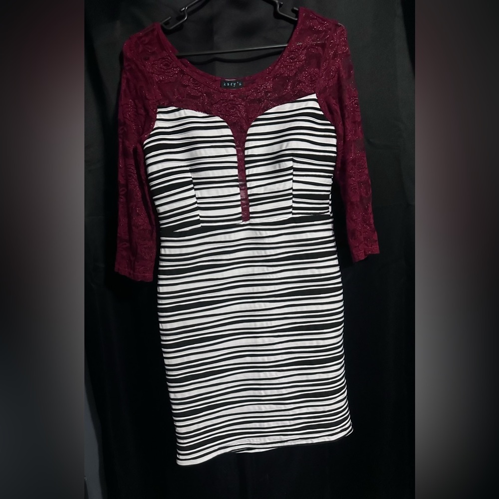 Black and white with a maroon lace.